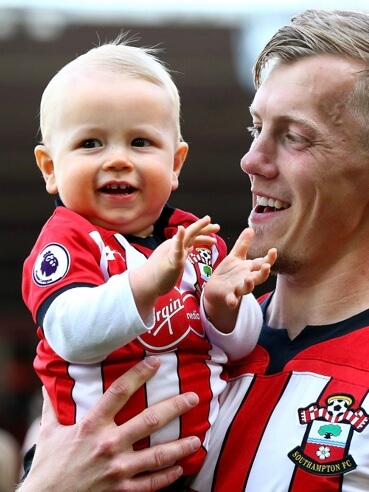 Olivia's husband, James Ward-Prowse, and their son.
